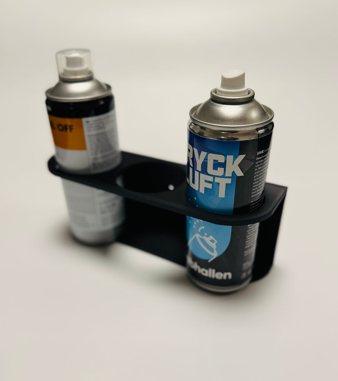 Wall mounted spray can holder for three cans