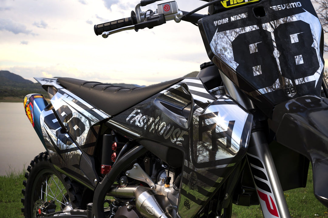 Graphics kit printed on a chrome mirror base, fitted to a Husqvarna